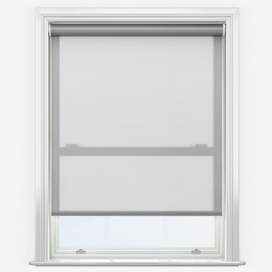 White framed window with a partially lowered gray roller shade and a visible lower pane.